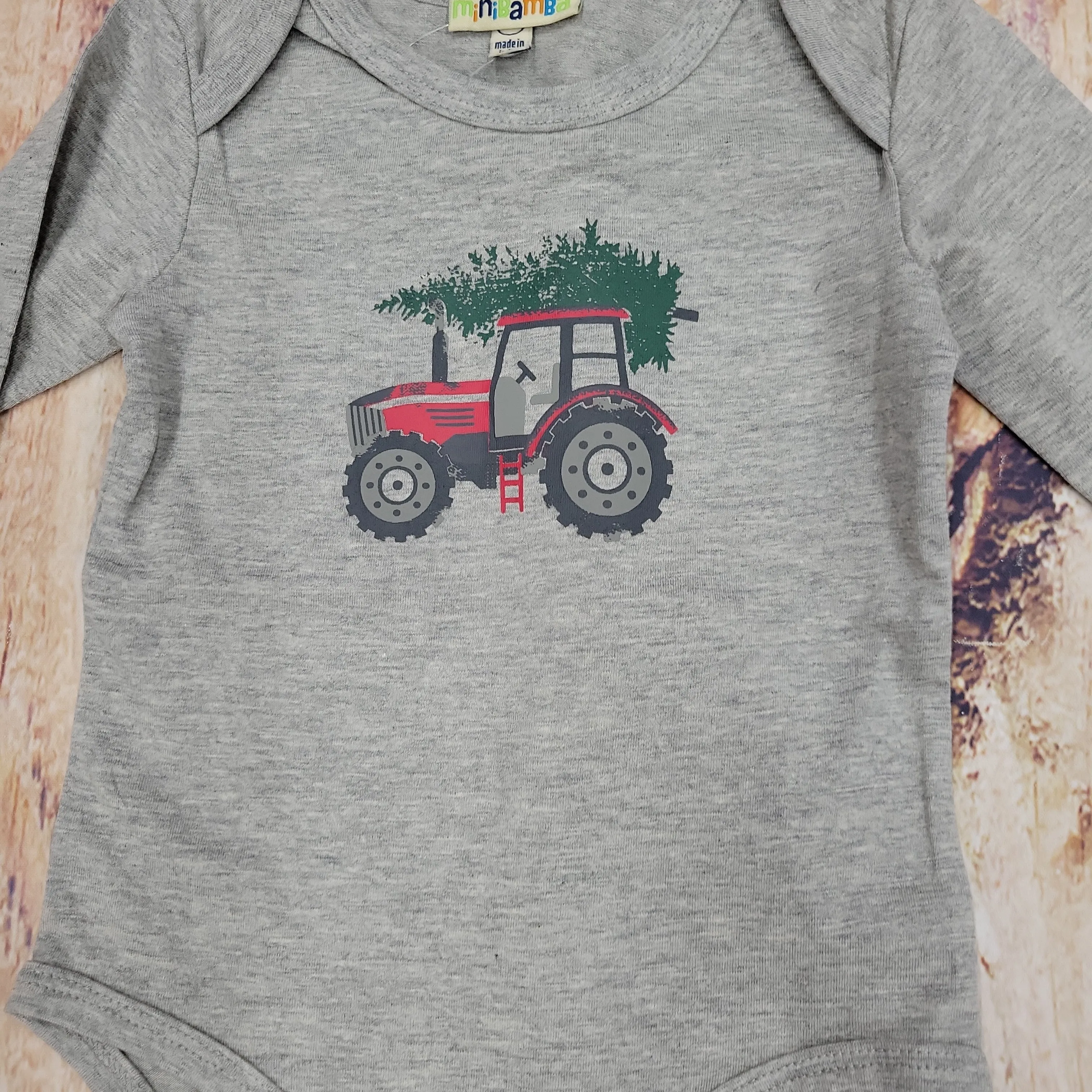 CR SPORTS RED TRACTOR AND TREE LONG SLEEVE ONESIE