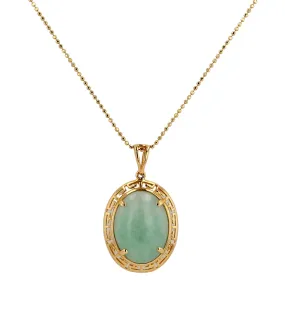 Yellow 14k gold chain and Burmese jade cabochon pendant